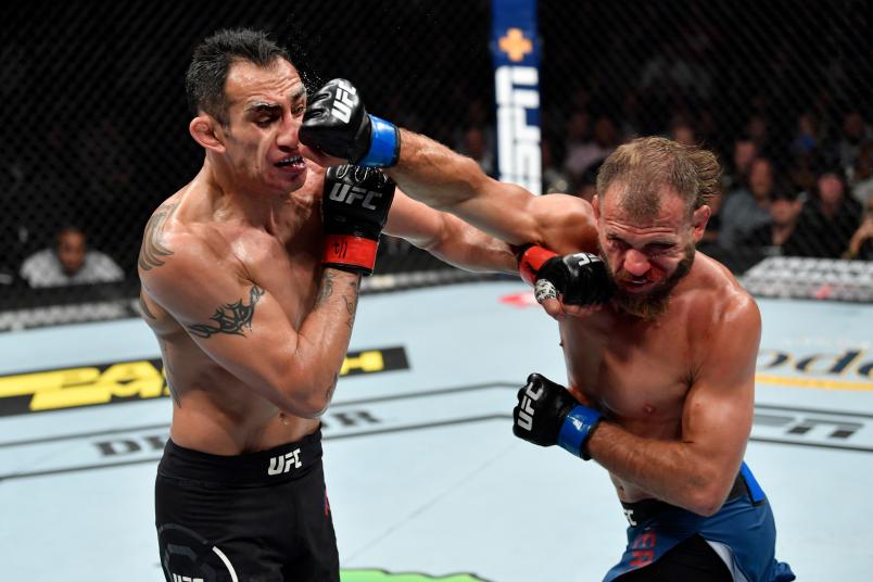 CHICAGO, IL - JUNE 08: (R-L) Donald Cerrone and Tony Ferguson exchange punches in their lightweight bout during the UFC 238 event at the United Center on June 8, 2019 in Chicago, Illinois. (Photo by Jeff Bottari/Zuffa LLC/Zuffa LLC via Getty Images)