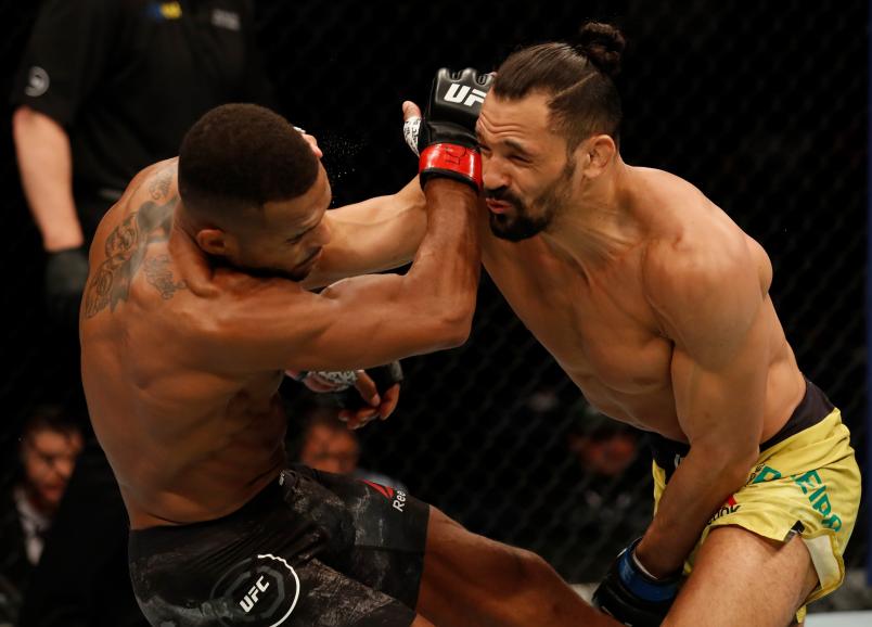 ROCHESTER, NY - MAY 18: (R-L) Michel Pereira of Brazil punches Danny Roberts of the United Kingdom in their welterweight bout during the UFC Fight Night event at Blue Cross Arena on May 18, 2019 in Rochester, New York. (Photo by Michael Owens/Zuffa LLC)
