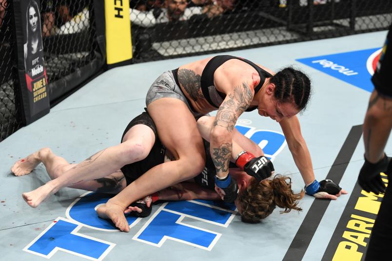 STOCKHOLM, SWEDEN - JUNE 01: Lina Lansberg of Sweden (top) punches Tonya Evinger in their women's bantamweight bout during the UFC Fight Night event at Ericsson Globe on June 1, 2019 in Stockholm, Sweden. (Photo by Jeff Bottari/Zuffa LLC/Zuffa LLC via Getty Images)