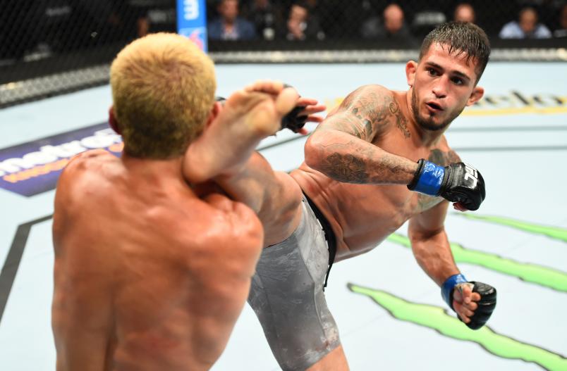 CHICAGO, ILLINOIS - JUNE 09: (R-L) Sergio Pettis kicks Joseph Benavidez in their flyweight fight during the UFC 225 event at the United Center on June 9, 2018 in Chicago, Illinois. (Photo by Josh Hedges/Zuffa LLC/Zuffa LLC via Getty Images)