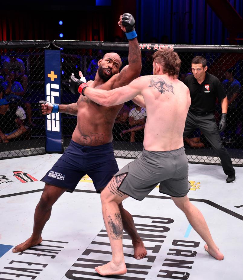 DonTale Mayes punches Ricardo Prasel of Brazil in their heavyweight bout during Dana White's Contender Series at the UFC Apex on July 16, 2019 in Las Vegas, Nevada. (Photo by Chris Unger/DWCS LLC)