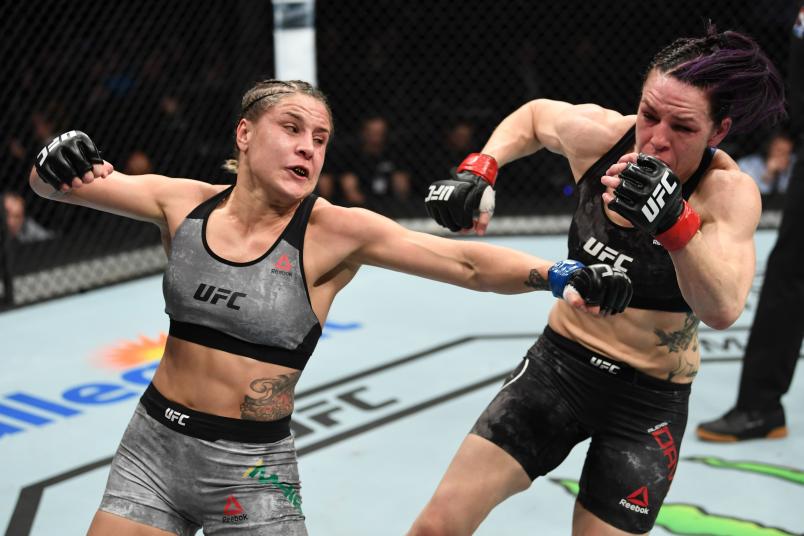NASHVILLE, TENNESSEE - MARCH 23: (L-R) Jennifer Maia of Brazil punches Alexis Davis of Canada in their women's flyweight bout during the UFC Fight Night event at Bridgestone Arena on March 23, 2019 in Nashville, Tennessee. (Photo by Jeff Bottari/Zuffa LLC/Zuffa LLC via Getty Images)