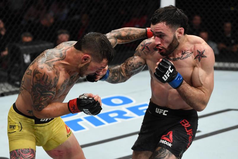 OTTAWA, ON - MAY 04: (R-L) Shane Burgos punches Cub Swanson in their featherweight bout during the UFC Fight Night event at Canadian Tire Centre on May 4, 2019 in Ottawa, Ontario, Canada. (Photo by Jeff Bottari/Zuffa LLC/Zuffa LLC via Getty Images)