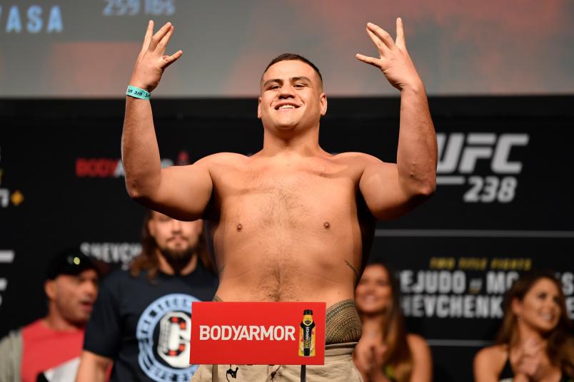 Tai Tuivasa of Australia poses on the scale during the UFC 238 weigh-in at the United Center on June 7, 2019 in Chicago, Illinois. (Photo by Jeff Bottari/Zuffa LLC/Zuffa LLC via Getty Images)