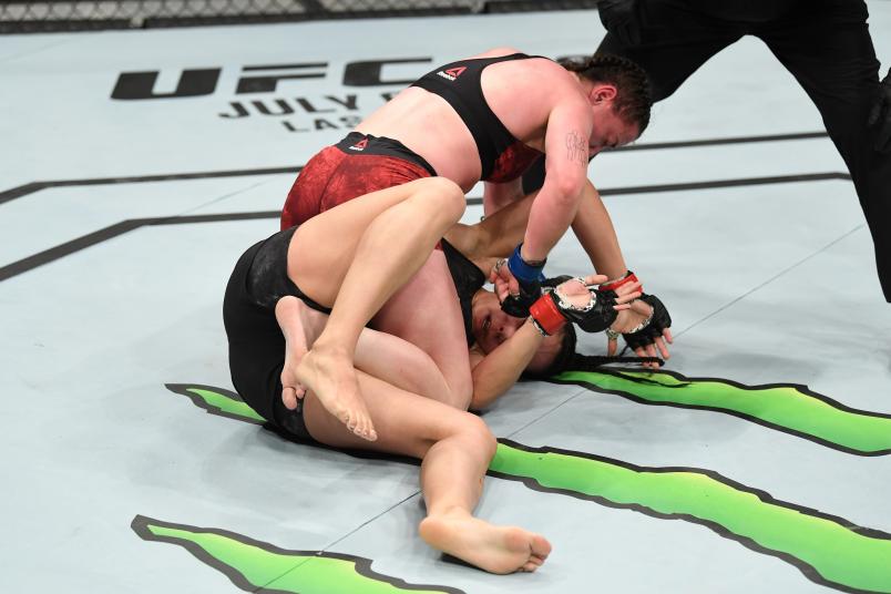 Molly McCann of England (top) punches Ariane Lipski of Brazil in their women's flyweight bout during the UFC Fight Night event at Bon Secours Wellness Arena on June 22, 2019 in Greenville, South Carolina. (Photo by Josh Hedges/Zuffa LLC via Getty Images)