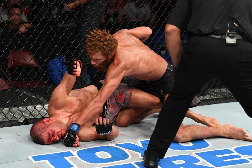 GREENVILLE, SC - JUNE 22: (R-L) Luis Pena punches Matt Wiman in their lightweight bout during the UFC Fight Night event at Bon Secours Wellness Arena on June 22, 2019 in Greenville, South Carolina. (Photo by Josh Hedges/Zuffa LLC/Zuffa LLC via Getty Images)