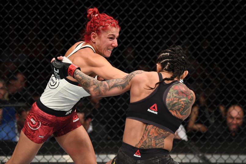 LAS VEGAS, NV - JULY 06: Randa Markos of Canada punches Claudia Gadelha of Brazil in their strawweight fight during the UFC 239 event at T-Mobile Arena on July 6, 2019 in Las Vegas, Nevada. (Photo by Josh Hedges/Zuffa LLC/Zuffa LLC)