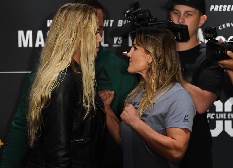 NEW YORK, NEW YORK - OCTOBER 31: (L-R) Opponents Katlyn Chookagian and Jennifer Maia of Brazil face off during the UFC 244 Ultimate Media Day on October 31, 2019 in New York City. (Photo by Josh Hedges/Zuffa LLC via Getty Images)