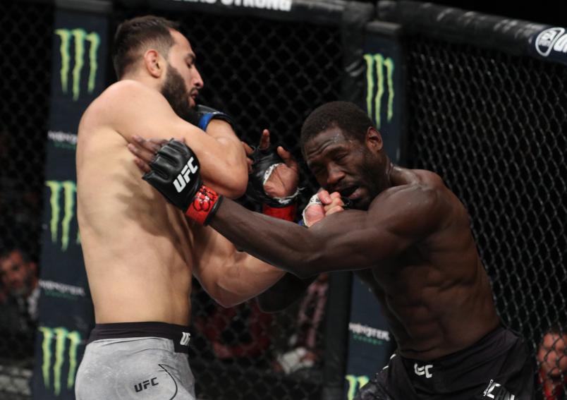 Dominick Reyes punches Jared Cannonier in their light heavyweight bout during the UFC Fight Night event at Movistar Arena on May 19, 2018 in Santiago, Chile. (Photo by Buda Mendes/Zuffa LLC/Zuffa LLC via Getty Images)