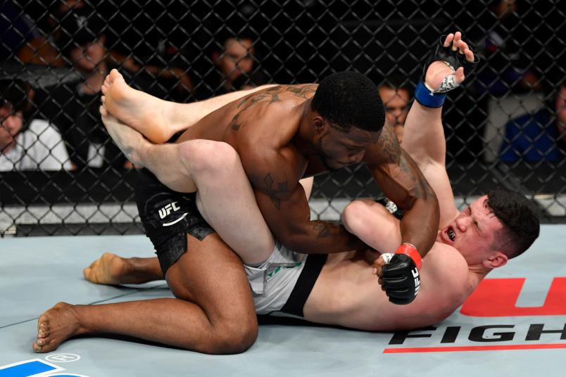 SACRAMENTO, CALIFORNIA - JULY 13: (L-R) Karl Roberson punches Wellington Turman in their middleweight bout during the UFC Fight Night event at Golden 1 Center on July 13, 2019 in Sacramento, California. (Photo by Jeff Bottari/Zuffa LLC)