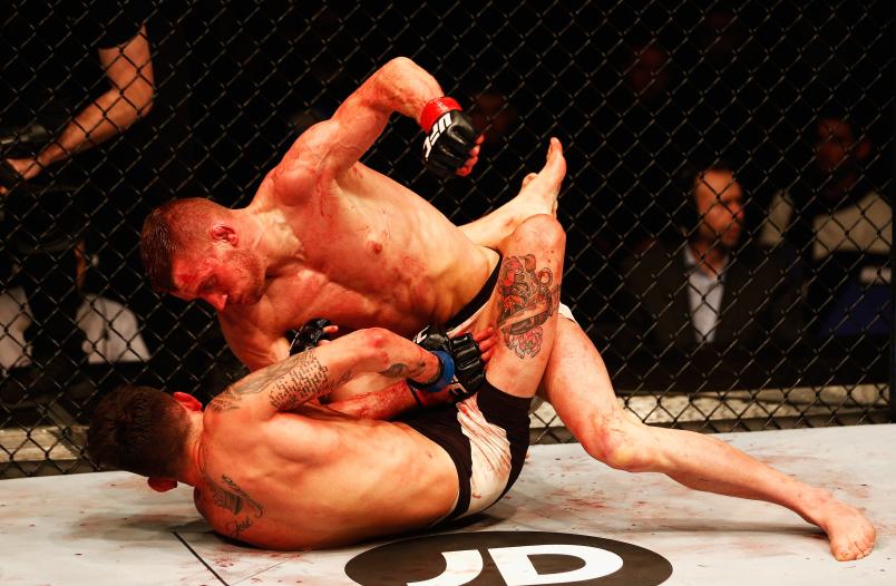 LONDON, ENGLAND - FEBRUARY 27: Davey Grant of England (R) and Marlon 'Chito' Vera of Ecuador (L) compete in their Bantamweight bout during the UFC Fight Night held on February 27, 2016 in London, England. (Photo by Dean Mouhtaropoulos/Zuffa LLC)