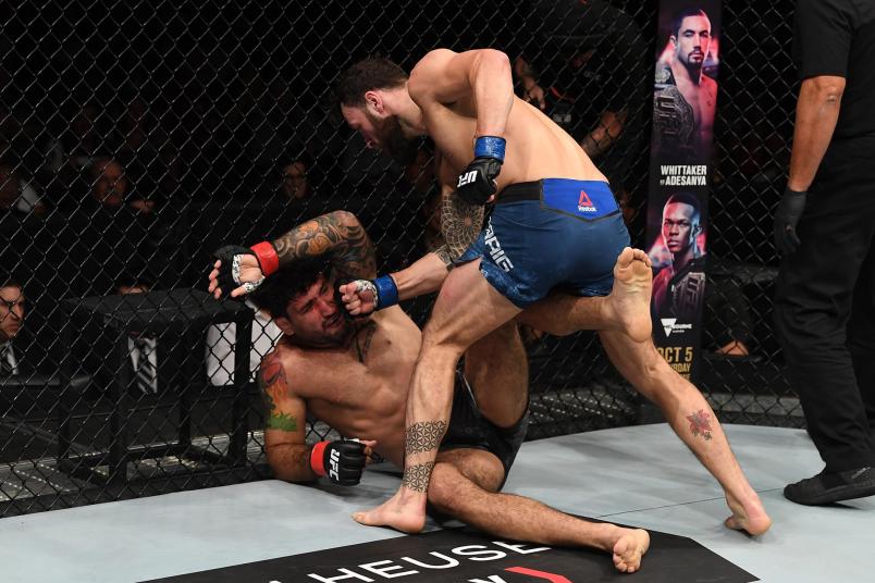 (R-L) Paul Craig of Scotland punches Vinicius Moreira of Brazil in their light heavyweight bout during the UFC Fight Night event on September 21, 2019 in Mexico City, Mexico. (Photo by Josh Hedges/Zuffa LLC)