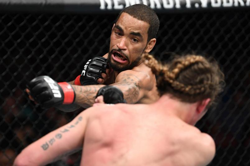 Roosevelt Roberts punches Thomas Gifford in their lightweight bout during the UFC Fight Night event at BB&T Center on April 27, 2019 in Sunrise, Florida. (Photo by Jeff Bottari/Zuffa LLC/Zuffa LLC via Getty Images)