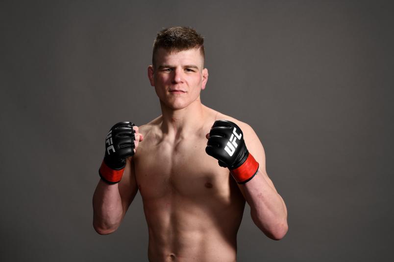 Grant Dawson poses for a post fight portrait backstage during the UFC Fight Night event at Intrust Bank Arena on March 9, 2019 in the Wichita, Kansas. (Photo by Mike Roach/Zuffa LLC via Getty Images)