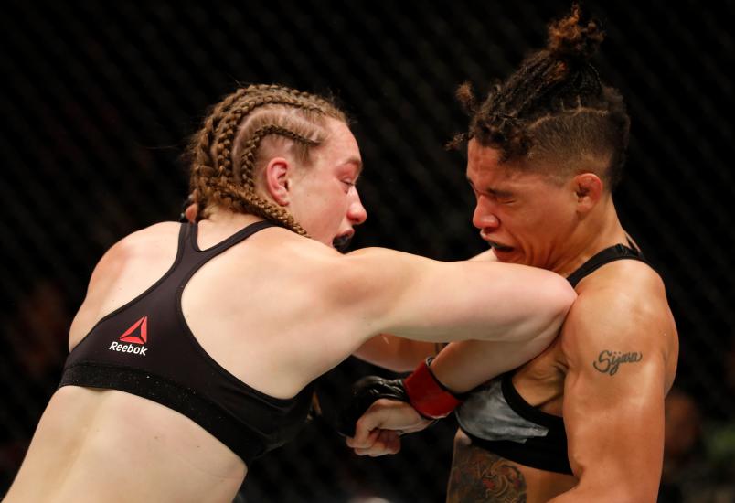 Aspen Ladd elbows Sijara Eubanks in their women's bantamweight bout during the UFC Fight Night event at Blue Cross Arena on May 18, 2019 in Rochester, New York. (Photo by Michael Owens/Zuffa LLC via Getty Images)