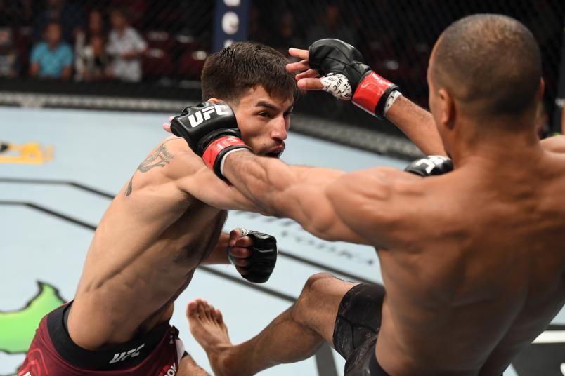 NEWARK, NJ - AUGUST 03: (L-R) Matt Schnell punches Jordan Espinosa in their flyweight bout during the UFC Fight Night event at the Prudential Center on August 3, 2019 in Newark, New Jersey. (Photo by Josh Hedges/Zuffa LLC)
