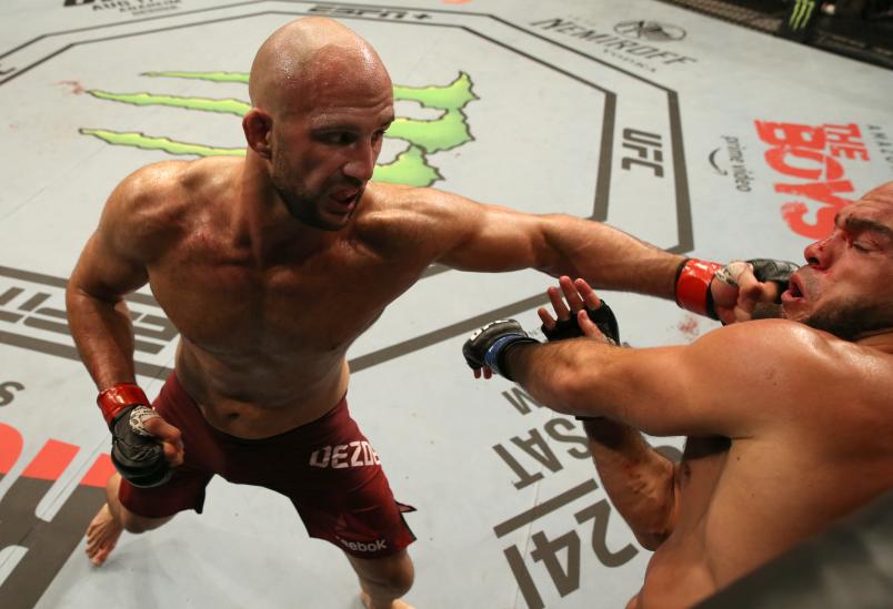 Volkan Oezdemir of Switzerland punches Ilir Latifi of Sweden in their light heavyweight fight during the UFC Fight Night event at Antel Arena on August 10, 2019 in Montevideo, Uruguay. (Photo by Alexandre Schneider/Zuffa LLC)