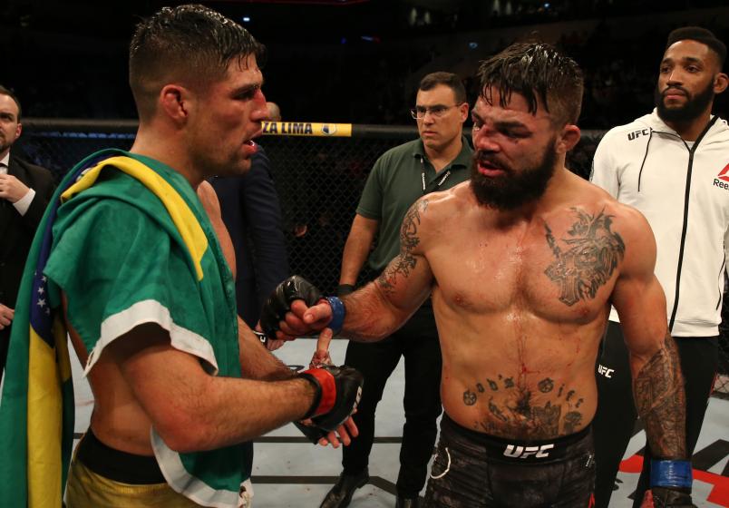 MONTEVIDEO, URUGUAY - AUGUST 10: (L-R) Vicente Luque and Mike Perry talk after their welterweight fight during the UFC Fight Night event at Antel Arena on August 10, 2019 in Montevideo, Uruguay. (Photo by Alexandre Schneider /Zuffa LLC/Zuffa LLC)