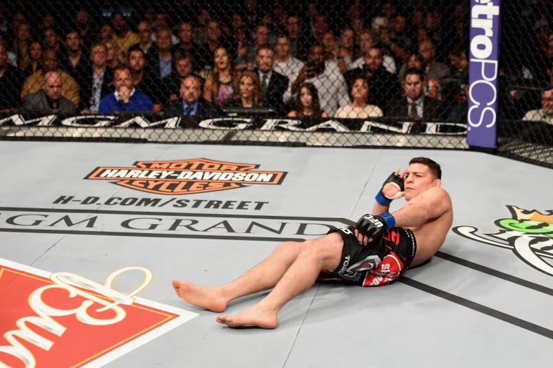 Nick Diaz taunts his opponent in their middleweight bout during the UFC 183 event at the MGM Grand Garden Arena on January 31, 2015 in Las Vegas, Nevada. (Photo by Josh Hedges/Zuffa LLC via Getty Images)