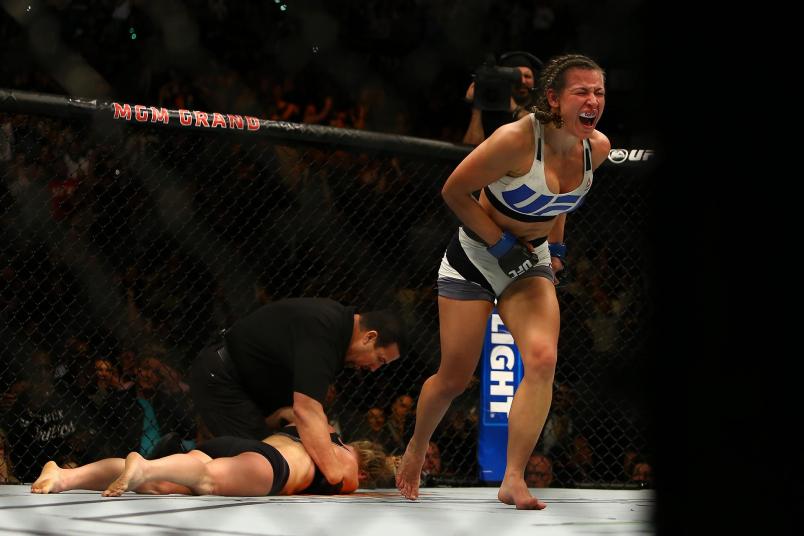Miesha Tate celebrates after defeating UFC bantamweight champion Holly Holm during UFC 196 at the MGM Grand Garden Arena on March 5, 2016 in Las Vegas, Nevada. (Photo by Rey Del Rio/Getty Images)