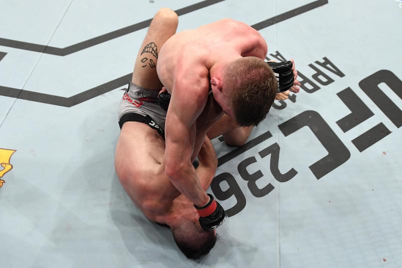 Grant Dawson punches Julian Erosa in their featherweight bout during the UFC Fight Night event at Intrust Bank Arena on March 9, 2019 in Wichita, Kansas. (Photo by Josh Hedges/Zuffa LLC)