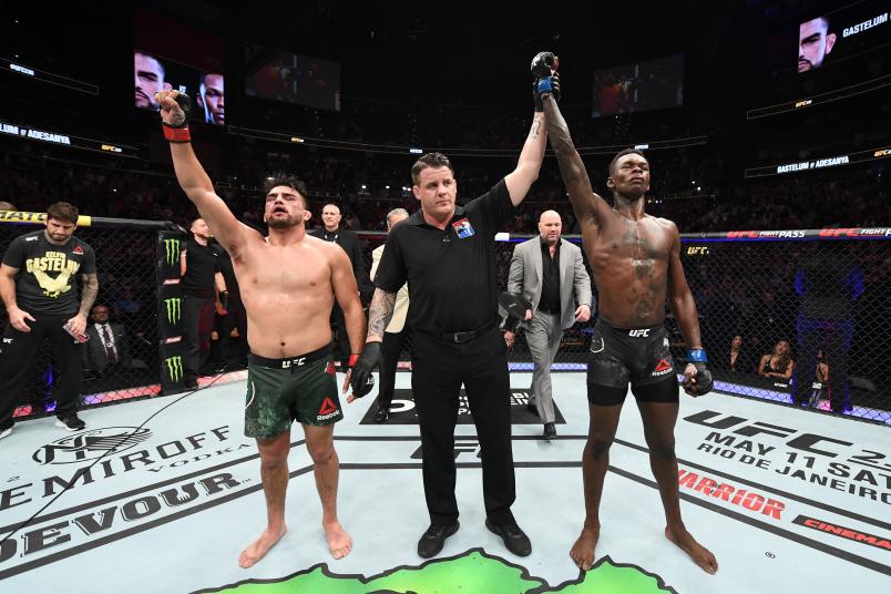 Israel Adesanya reacts after defeating Kelvin Gastelum by unanimous decision in their interim middleweight championship bout during the UFC 236 event at State Farm Arena on April 13, 2019 in Atlanta, Georgia. (Photo by Josh Hedges/Zuffa LLC via Getty Images)