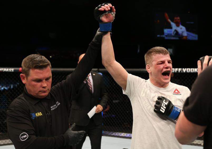 Grant Dawson celebrates after his submission victory over Michael Trizano in their featherweight bout during the UFC Fight Night event at Blue Cross Arena on May 18, 2019 in Rochester, New York. (Photo by Michael Owens/Zuffa LLC via Getty Images)