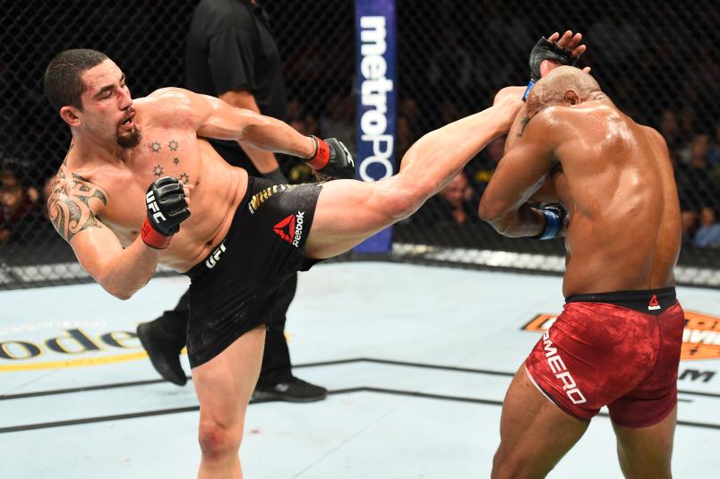 CHICAGO, ILLINOIS - JUNE 09: (L-R) Robert Whittaker of New Zealand kicks Yoel Romero of Cuba in their middleweight fight during the UFC 225 event at the United Center on June 9, 2018 in Chicago, Illinois. (Photo by Josh Hedges/Zuffa LLC/Zuffa LLC via Getty Images)