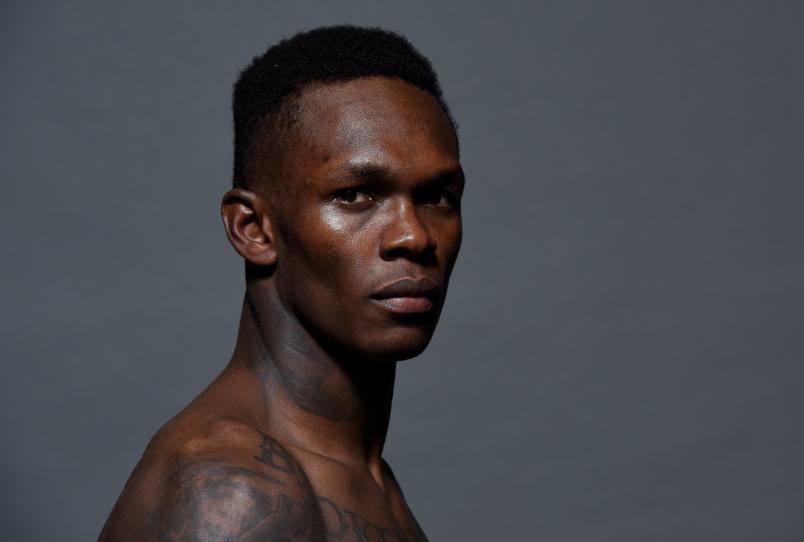 Israel Adesanya of Nigeria poses for a post fight portrait backstage during the UFC 221