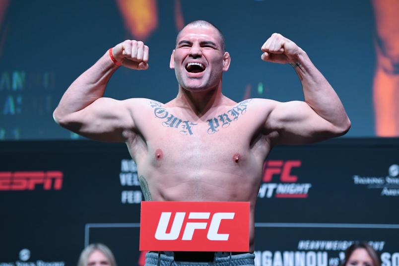 Cain Velasquez poses on the scale during the UFC Fight Night weigh-in
