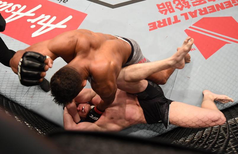 Alistair Overeem of The Netherlands punches down at Sergei Pavlovich of Russia in their heavyweight bout during the UFC Fight Night event inside Cadillac Arena on November 24, 2018 in Beijing, China. (Photo by Jeff Bottari/Zuffa LLC via Getty Images)
