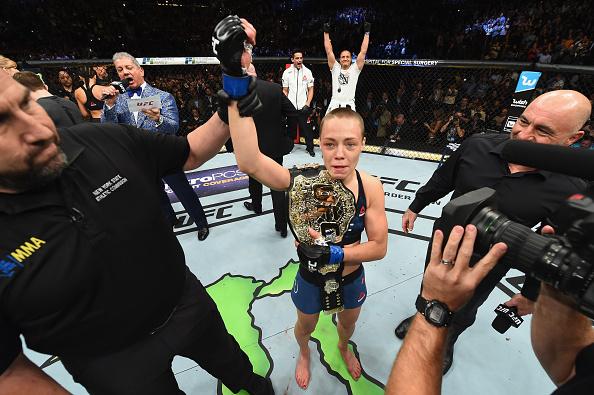 NEW YORK, NY - NOVEMBER 04: Rose Namajunas accepts her championship belt following her victory over Joanna Jedrzejczyk of Poland in their UFC women's strawweight championship bout during the UFC 217 event at Madison Square Garden on November 4, 2017 in N