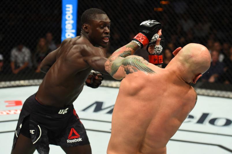 Curtis Millender (L) punches Thiago Alves of Brazil in their welterweight bout during the UFC Fight Night event at Frank Erwin Center on February 18, 2018 in Austin, Texas. (Photo by Josh Hedges/Zuffa LLC)