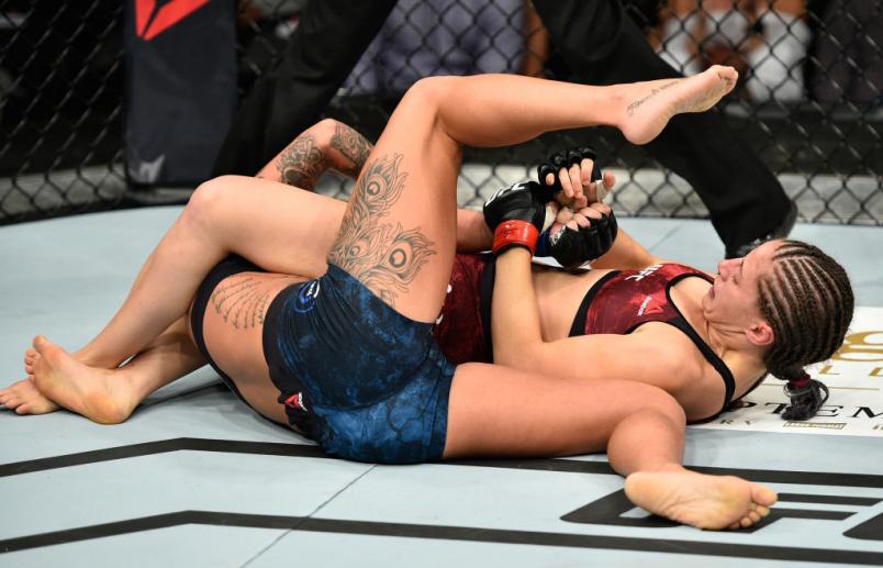 EDMONTON, AB - SEPTEMBER 09: (R-L) Sarah Moras of Canada attempts to submit Ashlee Evans-Smith in their women's bantamweight bout during the UFC 215 event inside the Rogers Place on September 9, 2017 in Edmonton, Alberta, Canada. (Photo by Jeff Bottari/Z