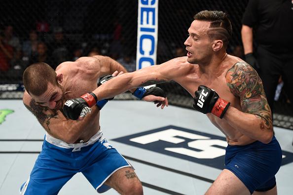 LAS VEGAS, NV - JULY 07: (R-L) James Krause punches Tom Gallicchio in their welterweight bout during The Ultimate Fighter Finale at T-Mobile Arena on July 7, 2017 in Las Vegas, Nevada. (Photo by Brandon Magnus/Zuffa LLC/Zuffa LLC via Getty Images)