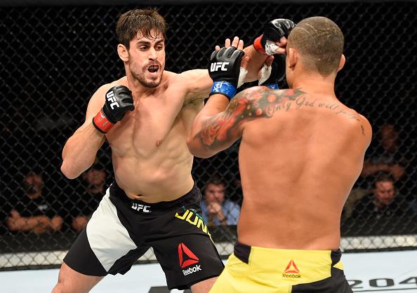 HIDALGO, TX - SEPTEMBER 17: (L-R) Antonio Carlos Junior of Brazil punches Leonardo Augusto Leleco of Brazil in their middleweight bout during the UFC Fight Night event at State Farm Arena on September 17, 2016 in Hidalgo, Texas. (Photo by Josh Hedges/Zu