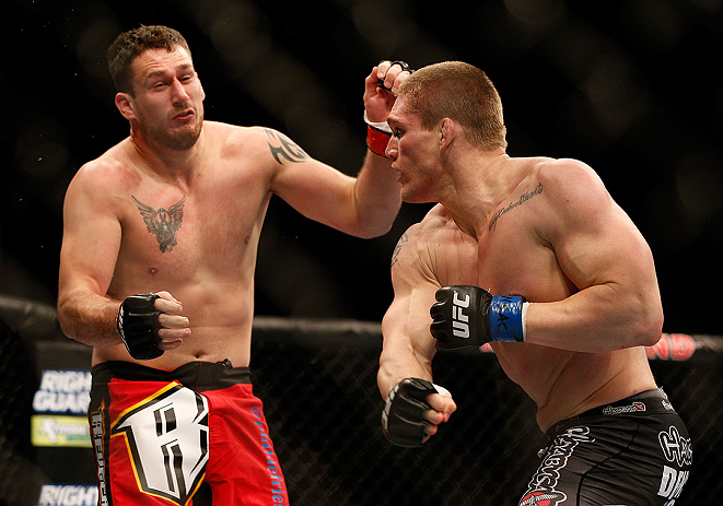 LAS VEGAS, NV - DECEMBER 29: Todd Duffee (right) punches Phil De Fries during their heavyweight fight at UFC 155 on December 29, 2012 at MGM Grand Garden Arena in Las Vegas, Nevada. (Photo by Josh Hedges/Zuffa LLC/Zuffa LLC via Getty Images) *** Local Ca
