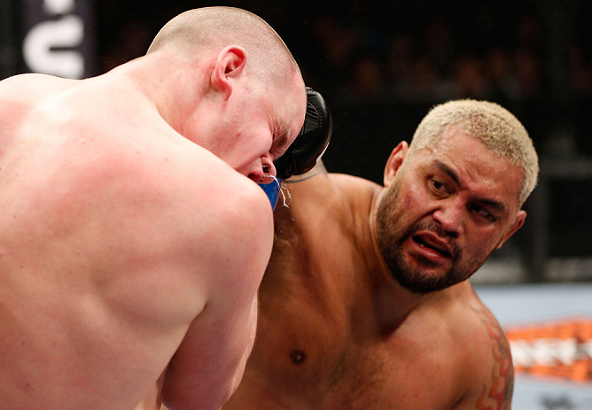 SAITAMA, JAPAN - MARCH 03: (R-L) Mark Hunt punches Stefan Struve in their heavyweight fight during the UFC on FUEL TV event at Saitama Super Arena on March 3, 2013 in Saitama, Japan. (Photo by Josh Hedges/Zuffa LLC/Zuffa LLC via Getty Images)