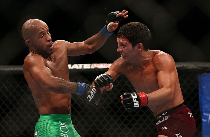 TORONTO, CANADA - SEPTEMBER 22: (R-L) Joseph Benavidez punches Demetrious Johnson during their flyweight championship bout at UFC 152 inside Air Canada Centre on September 22, 2012 in Toronto, Ontario, Canada. (Photo by Josh Hedges/Zuffa LLC/Zuffa LLC