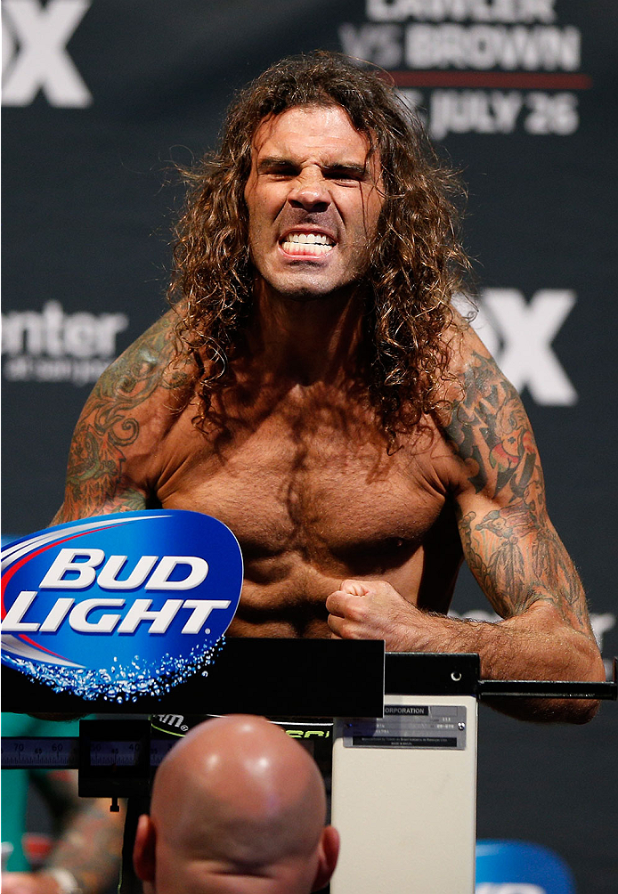 SAN JOSE, CA - JULY 25: Clay Guida poses on the scale after making weight during the UFC fight night weigh-in at the SAP Center on July 25, 2014 in San Jose, California. (Photo by Josh Hedges/Zuffa LLC/Zuffa LLC via Getty Images)