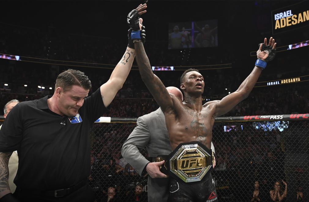 ATLANTA, GA - APRIL 13: (L-R) UFC President Dana White places the interim middleweight championship belt on Israel Adesanya after defeating Kelvin Gastelum by unanimous decision in their interim middleweight championship bout during the UFC 236 event at State Farm Arena on April 13, 2019 in Atlanta, Georgia. (Photo by Josh Hedges/Zuffa LLC/Zuffa LLC via Getty Images)