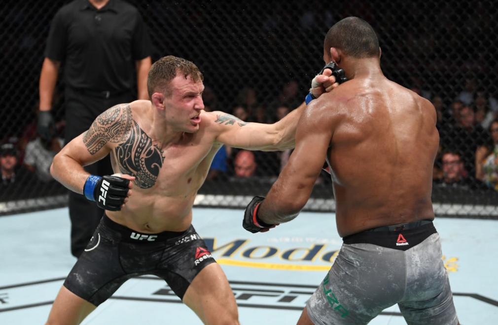 Jack Hermansson of Sweden punches Jacare Souza