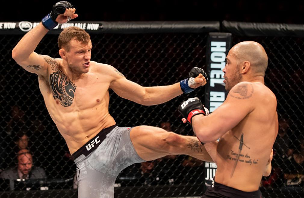 Jack Hermansson of Sweden kicks Thales Leite