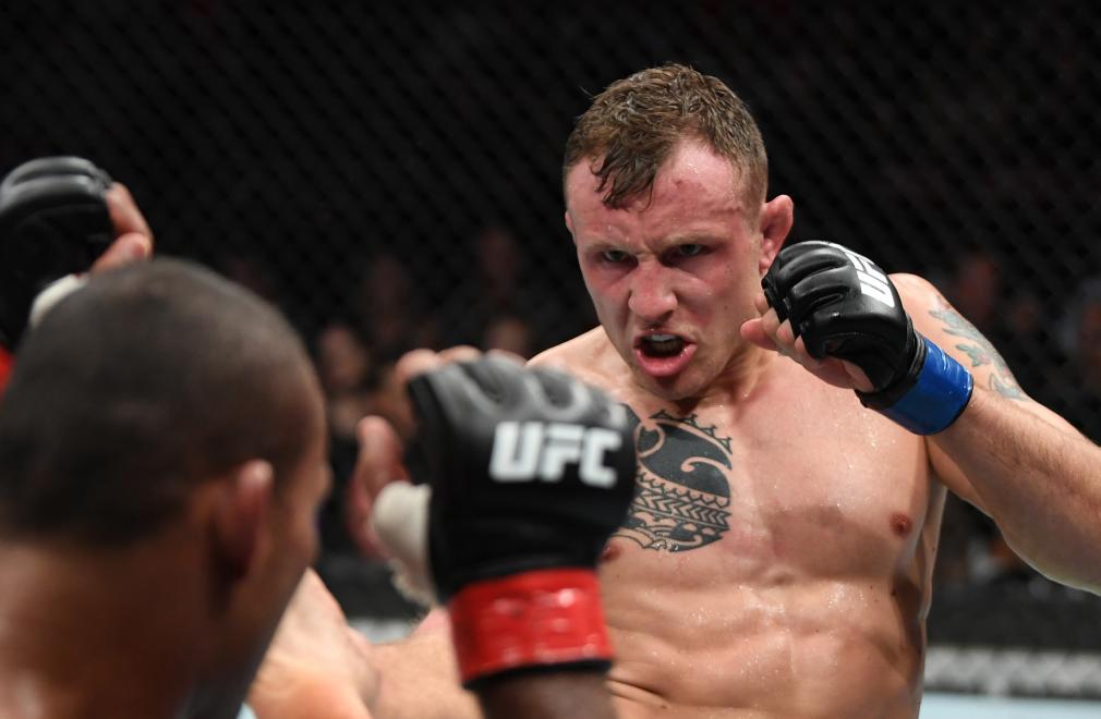 Jack Hermansson of Sweden kicks Jacare Souza