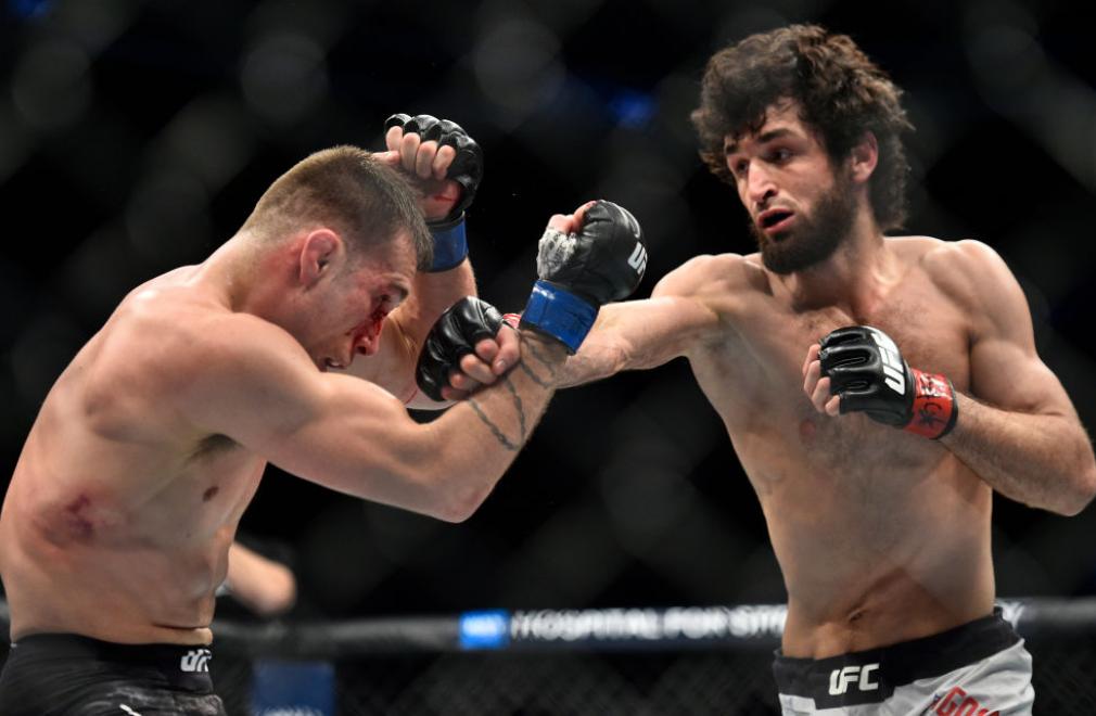 BROOKLYN, NEW YORK - APRIL 07: (R-L) Zabit Magomedsharipov of Russia punches Kyle Bochniak in their featherweight bout during the UFC 223 event inside Barclays Center on April 7, 2018 in Brooklyn, New York. (Photo by Brandon Magnus/Zuffa LLC/Zuffa LLC v