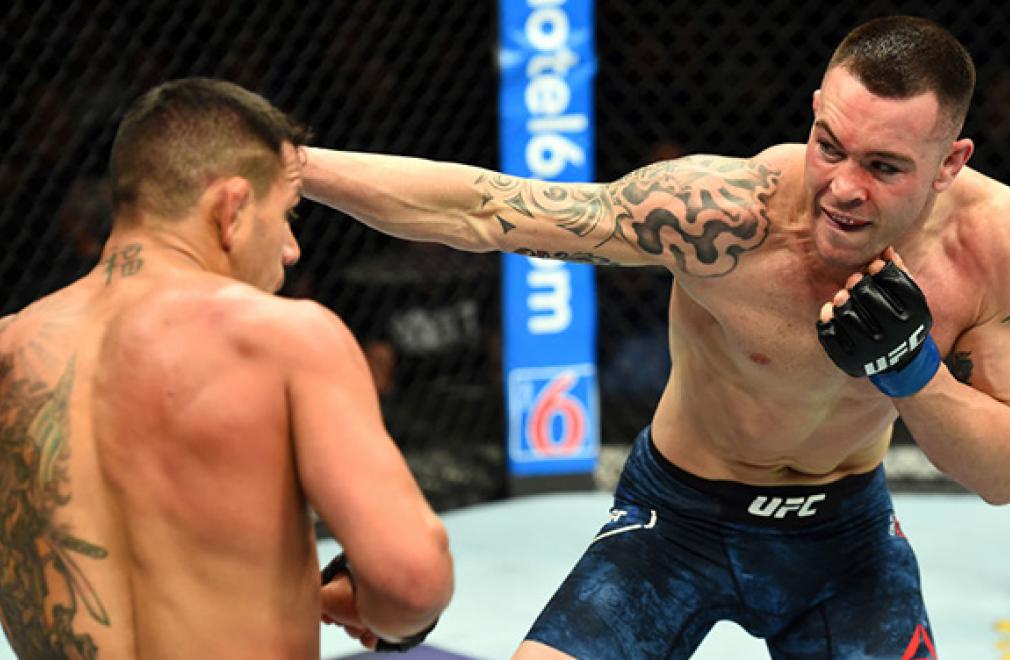 CHICAGO, ILLINOIS - JUNE 09: (R-L) Colby Covington punches Rafael Dos Anjos of Brazil in their interim welterweight title fight during the UFC 225 event at the United Center on June 9, 2018 in Chicago, Illinois. (Photo by Josh Hedges/Zuffa LLC/Zuffa LLC