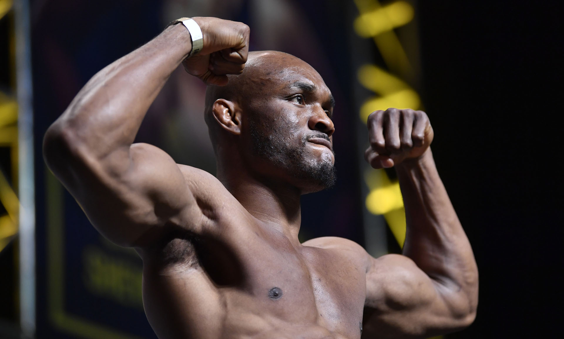  Kamaru Usman poses on the scale during the UFC 261 Weigh-In at at VyStar Veterans Memorial Arena on April 23, 2021 in Jacksonville, Florida. (Photo by Chris Unger/Zuffa LLC)