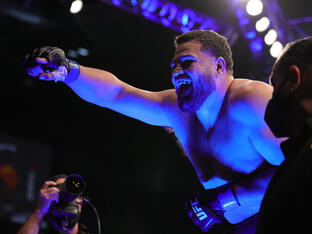  Tai Tuivasa of Australia celebrates his knockout victory over Augusto Sakai of Brazil during their heavyweight fight during the UFC 269 event at T-Mobile Arena on December 11, 2021 in Las Vegas, Nevada. (Photo by Carmen Mandato/Getty Images)