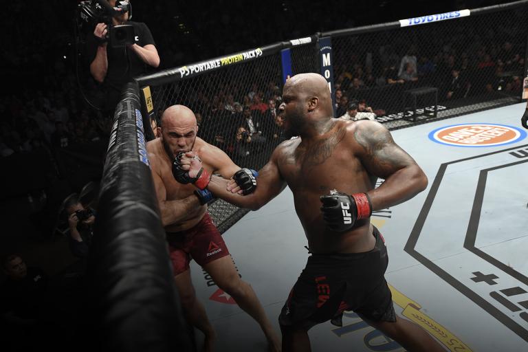 Derrick Lewis drops Aleksei Oleinik of Russia in their heavyweight fight during the UFC Fight Night event at UFC APEX on August 08, 2020 in Las Vegas, Nevada. (Photo by Chris Unger/Zuffa LLC)