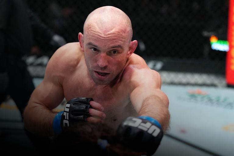 LAS VEGAS, NEVADA - AUGUST 21: (L-R) Mark O. Madsen of Denmark punches Clay Guida in a lightweight fight during the UFC Fight Night event at UFC APEX on August 21, 2021 in Las Vegas, Nevada. (Photo by Chris Unger/Zuffa LLC)